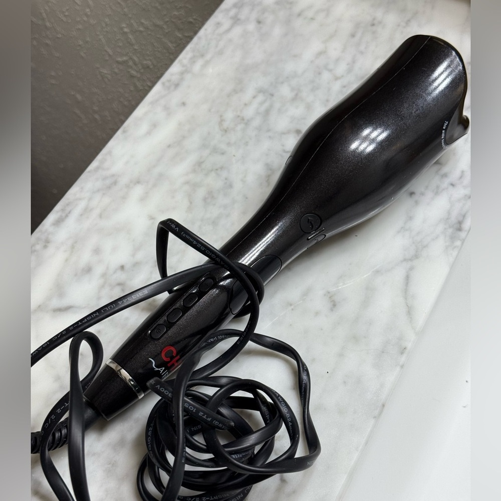 The device is a CHI Spin N Curl